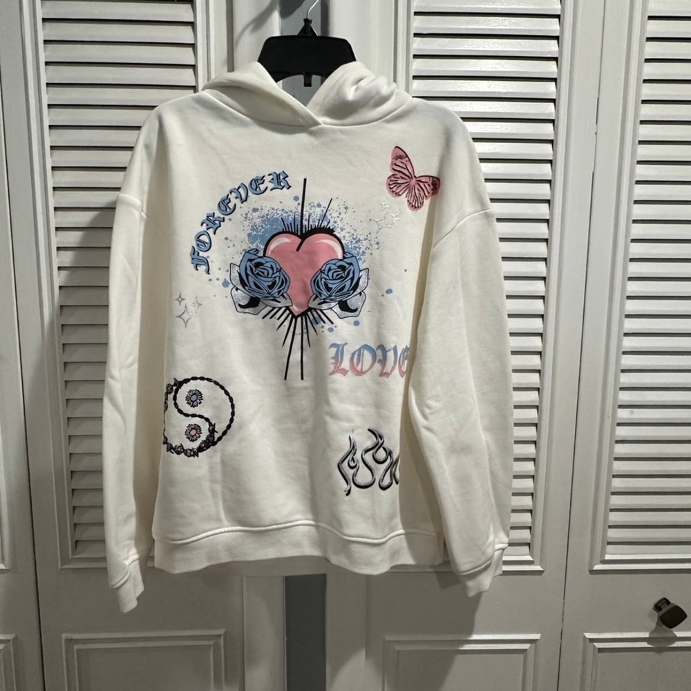 Primark Off-White Hoodie with Pink and Blue Motifs